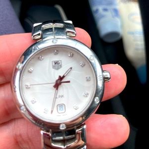 Tag Heuer Ladies link watch with diamonds.